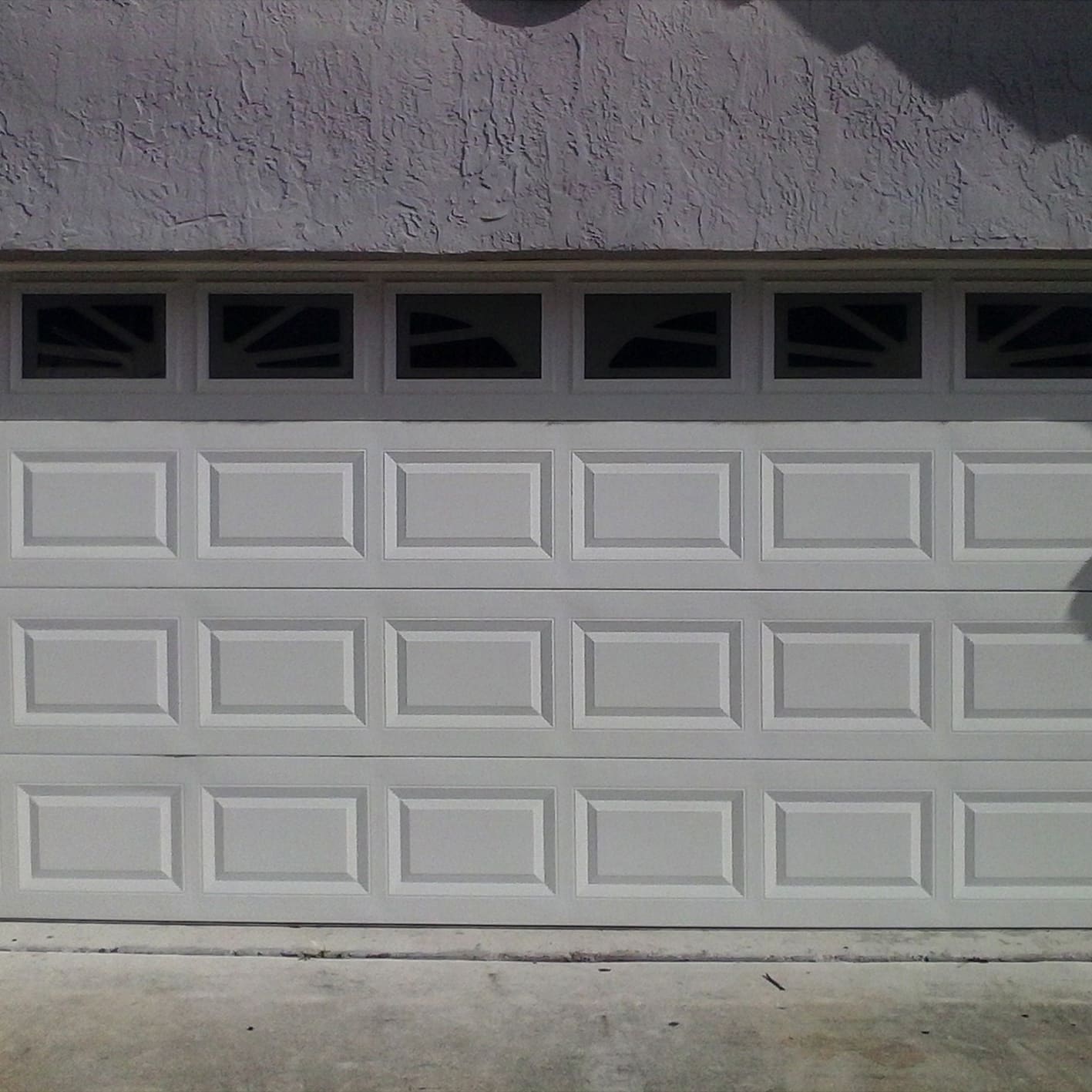 Roll-up garage door decorated with Snow White PVC laminated metal plate