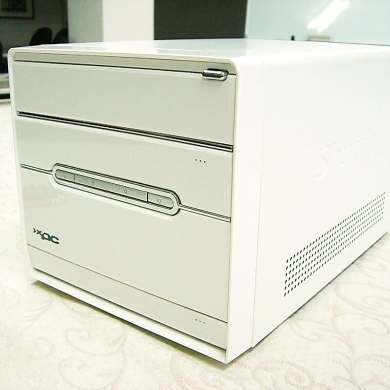 Mini PC case decorated with plain series laminated metal plate